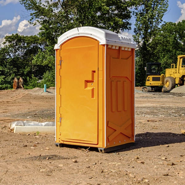 what is the cost difference between standard and deluxe portable toilet rentals in Mentone
